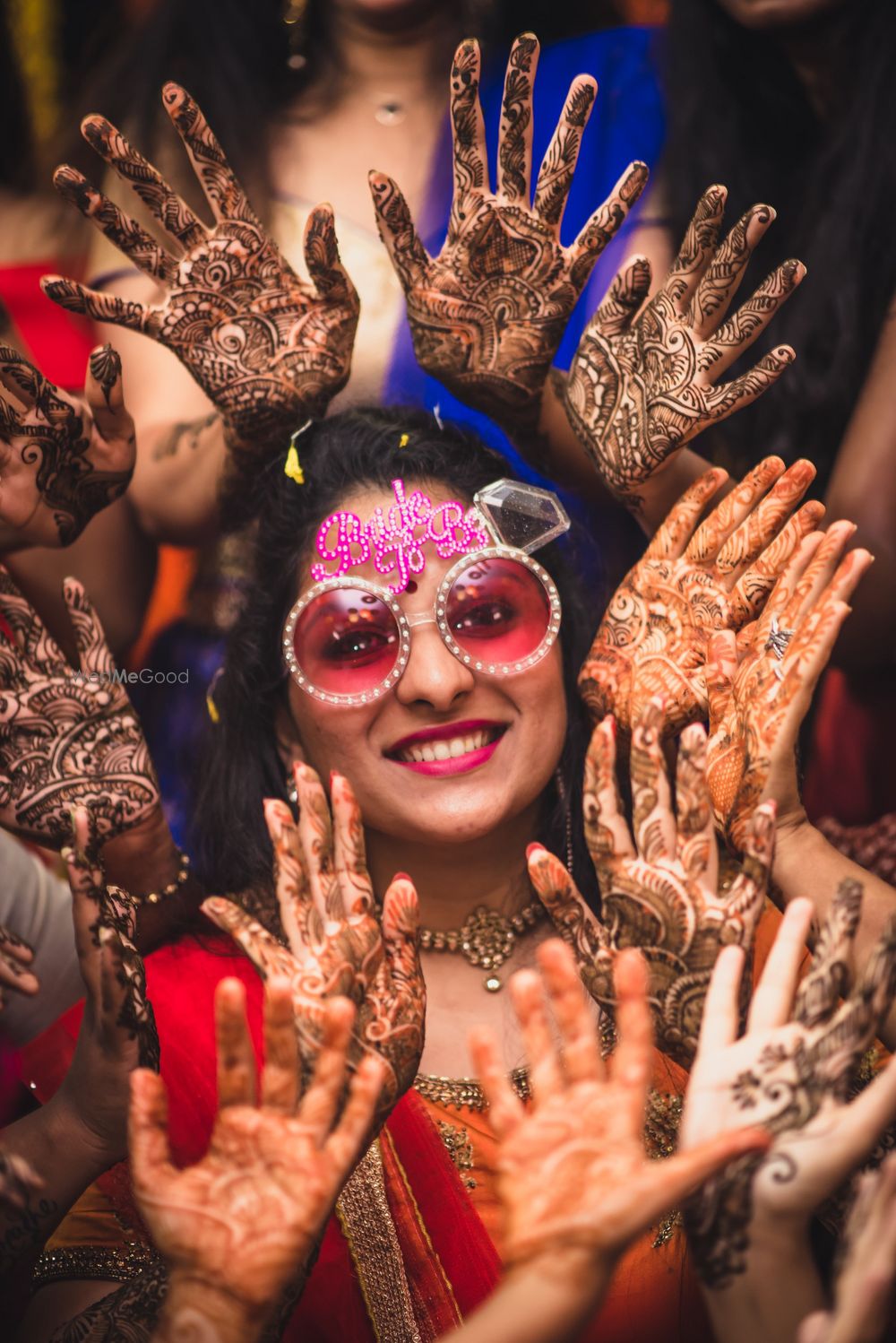 Photo of Bride with bridesmaids mehendi photo ideas