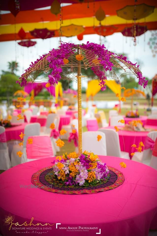 Photo of Parasol style floral centrepiece