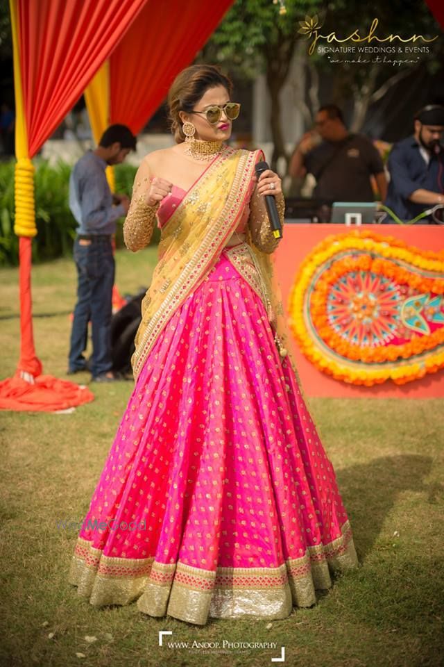 Photo of Yellow and pink bridesmaid lehenga