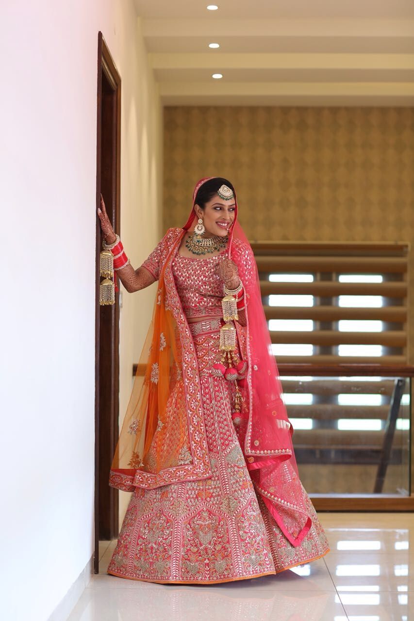 Photo of Hot pink bridal lehenga for Sikh bride
