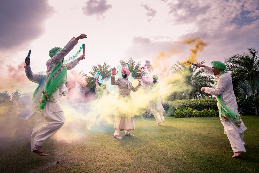Photo of Groom with groomsmen and holi colours