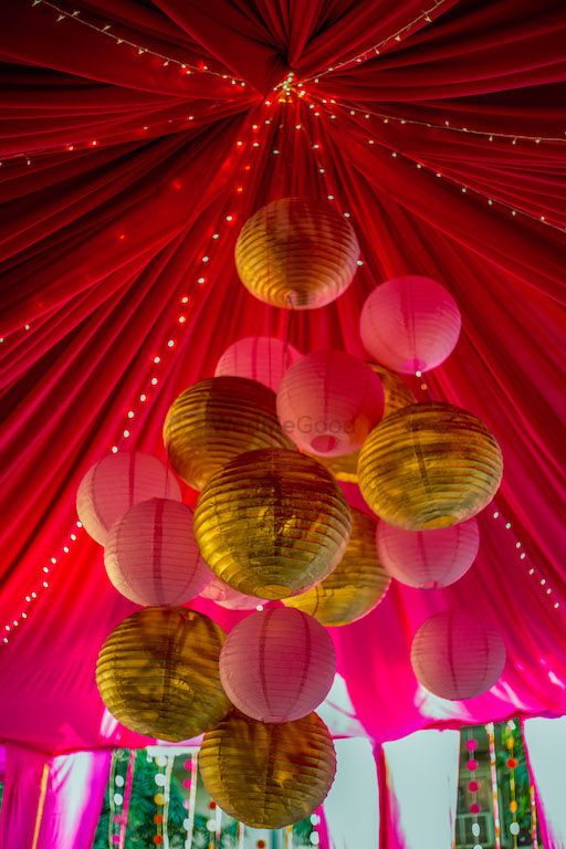 Photo of gold and pink paper lanterns
