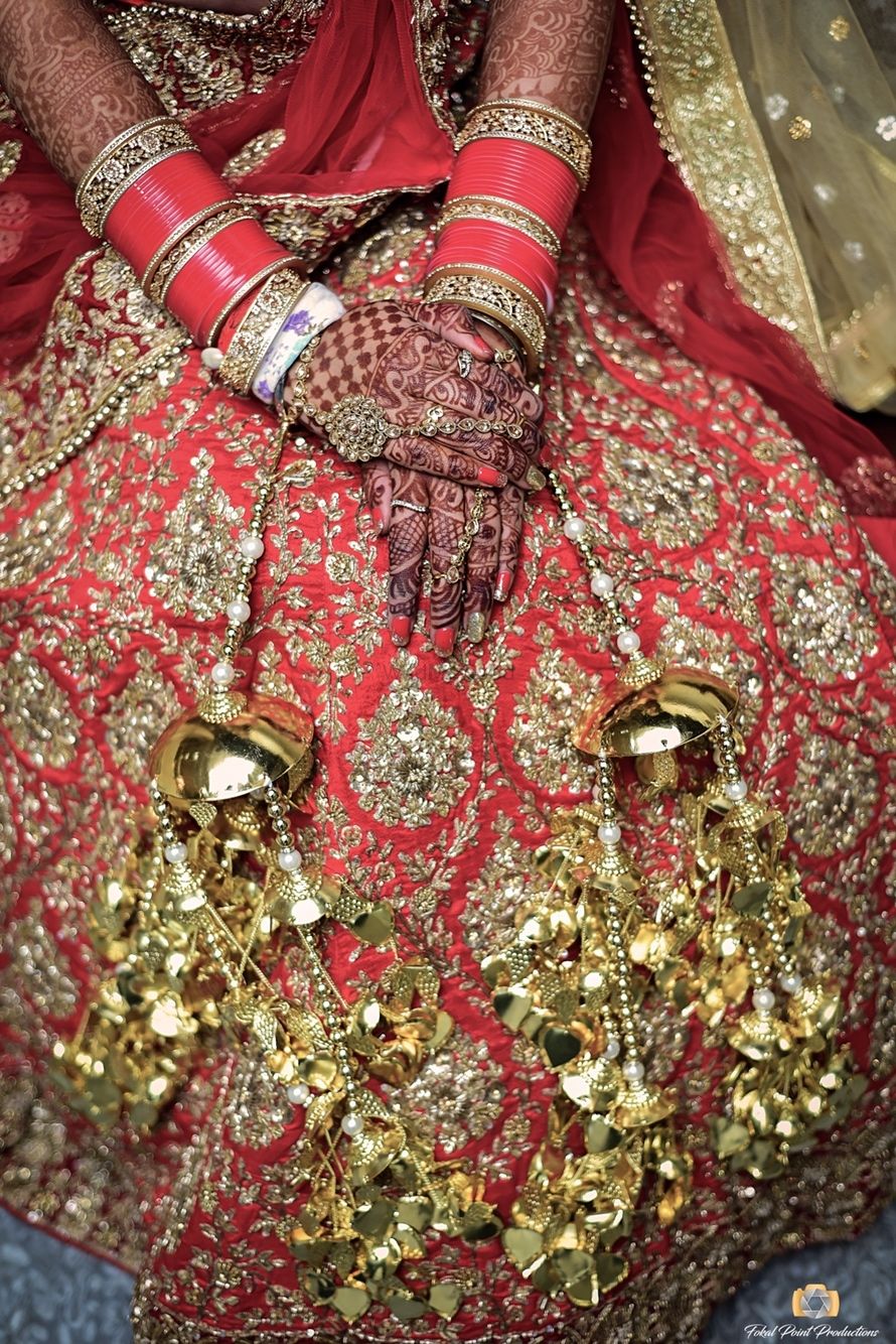Photo of Close up shots of bridal hands and kaleere