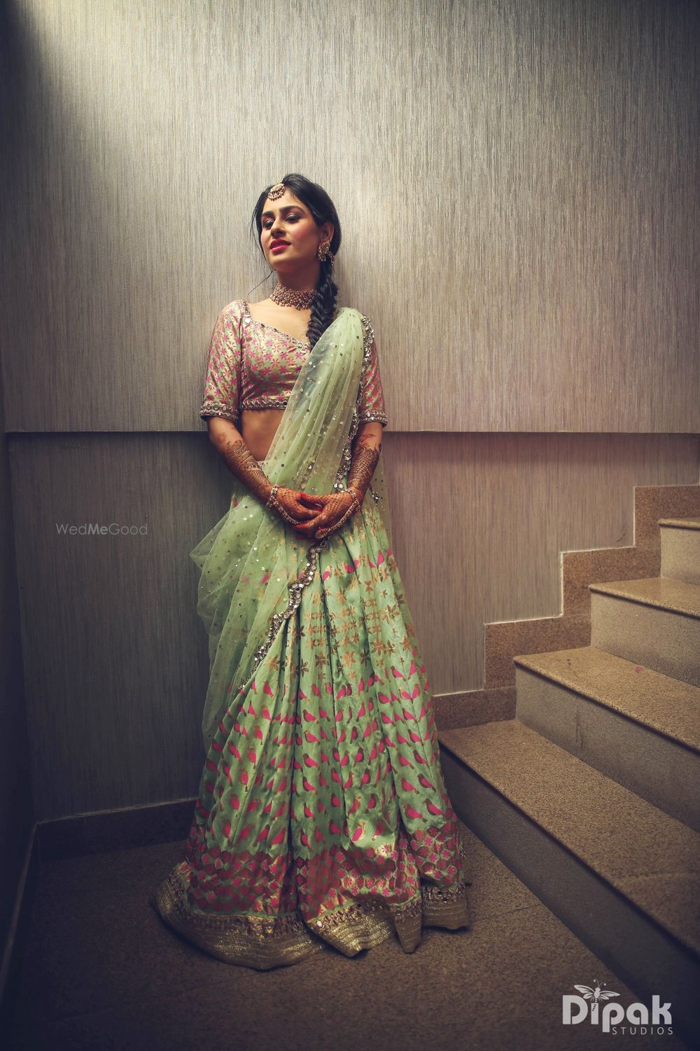 Photo of Light green mehendi lehenga with motifs