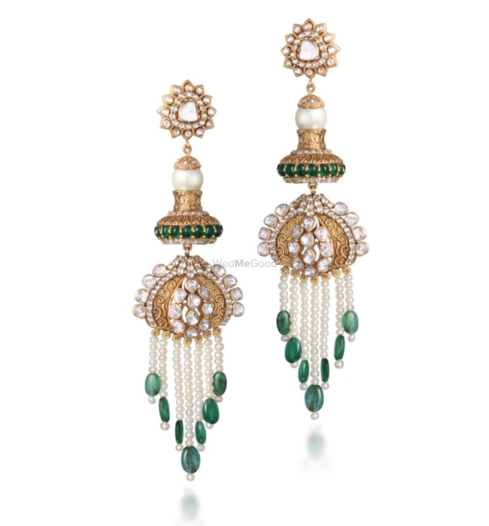 Photo of emerald and gold earrings