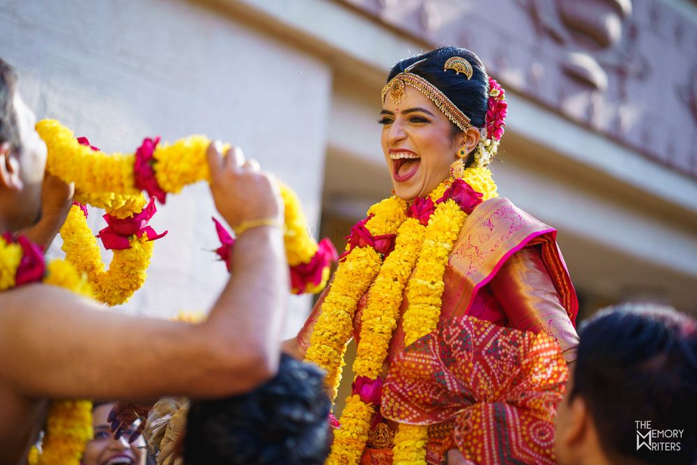 Photo of A south indian bride laughs her heart out during her wedding