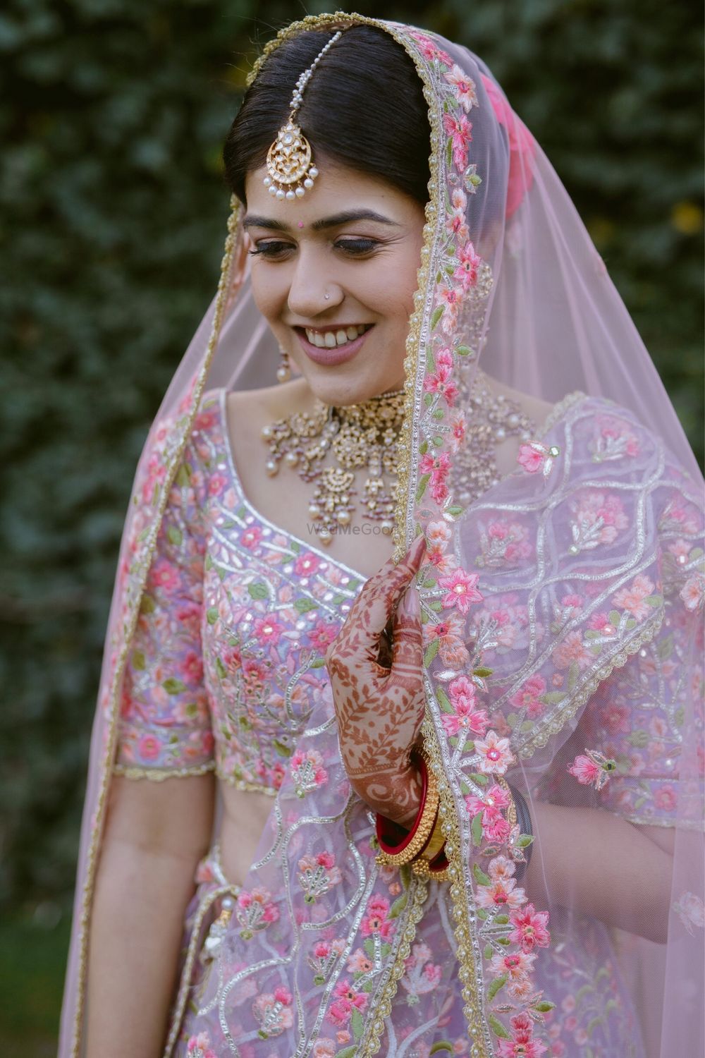 Photo of Unique bridal lehenga with lavender and pink