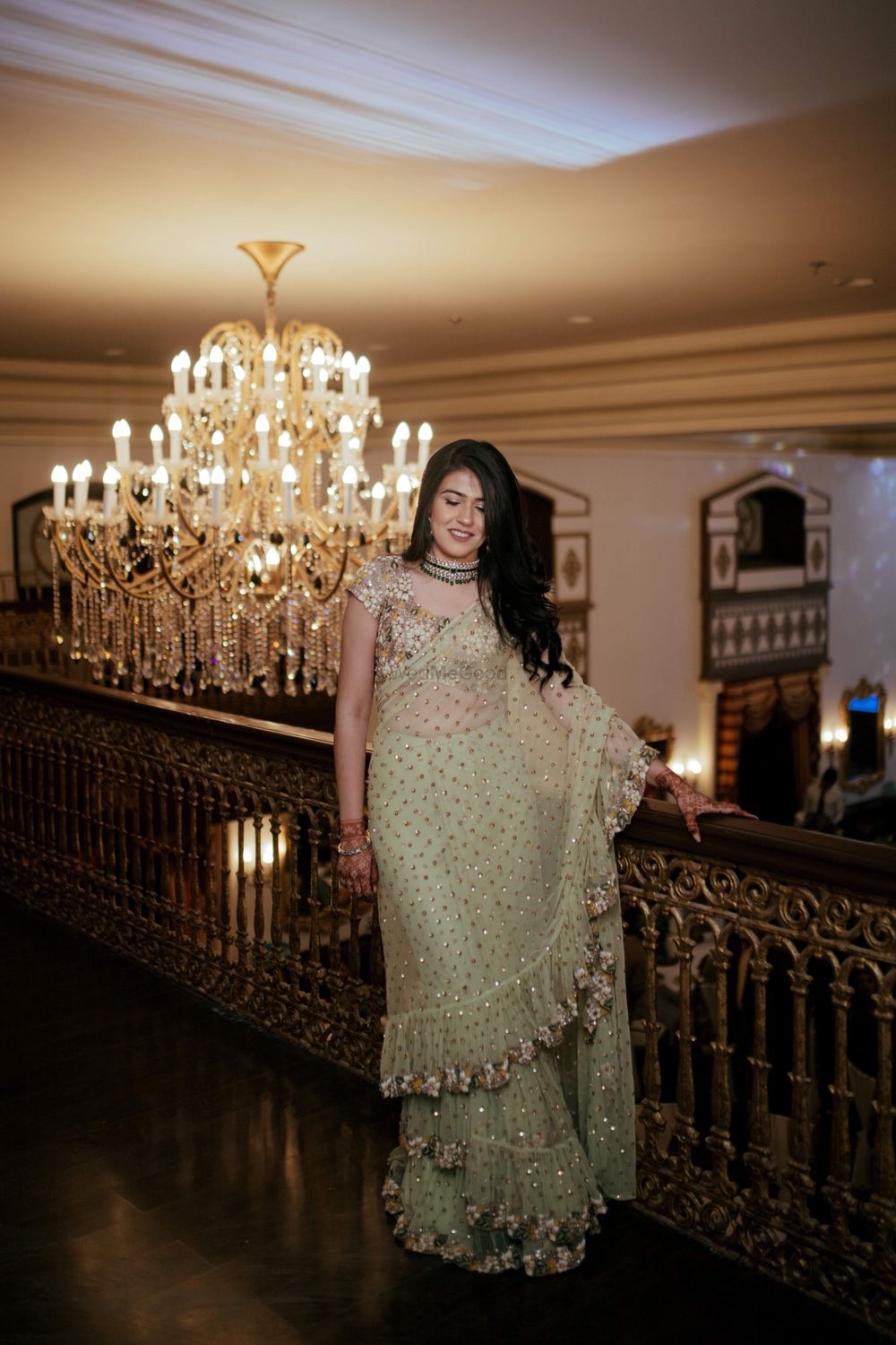 Photo of Gold and mint green ruffled saree