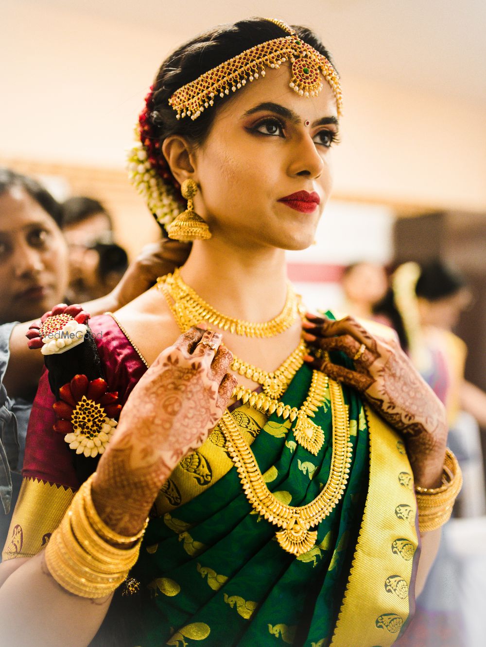 Photo of South Indian bridal look in green saree gold jewellery