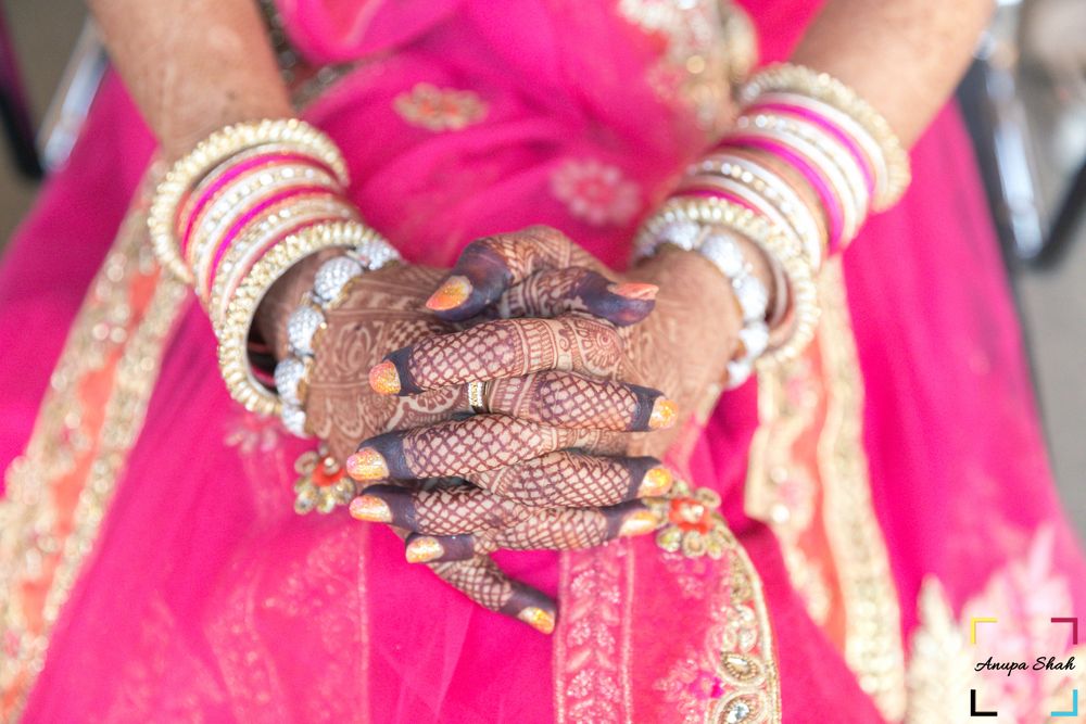 Photo of Bridal Mehendi with hot pink lehenga