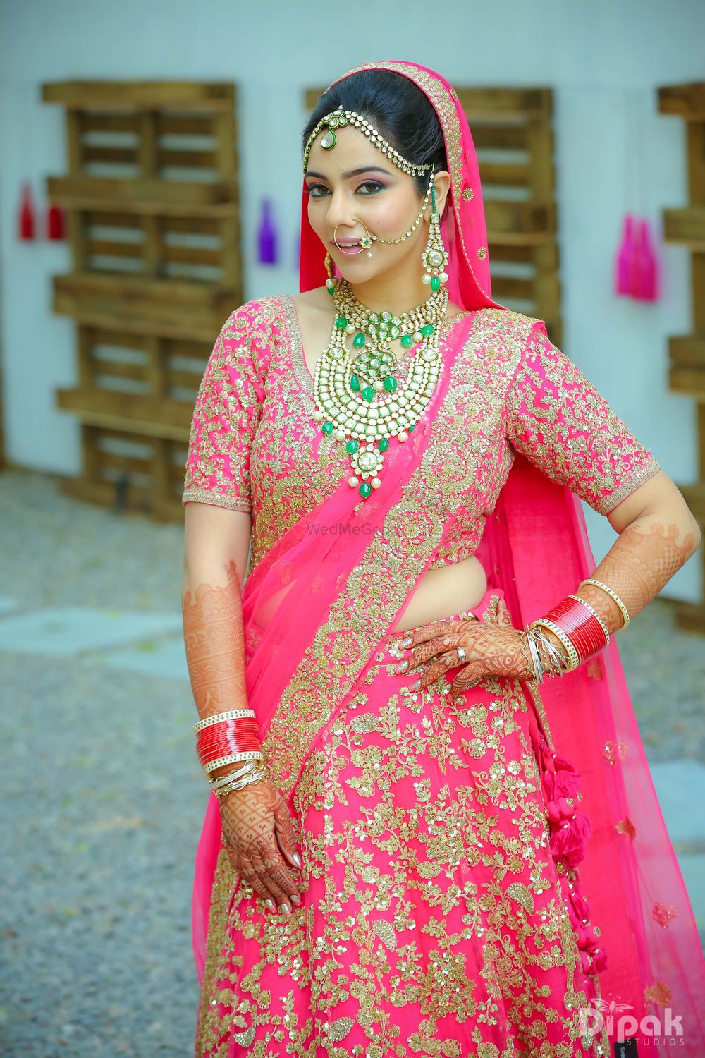 Photo of bright pink bridal lehenga