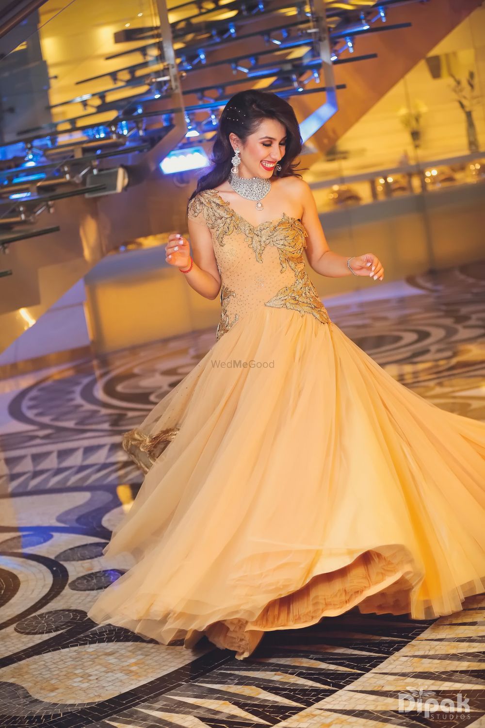 Photo of Dull Gold Twirling Gown