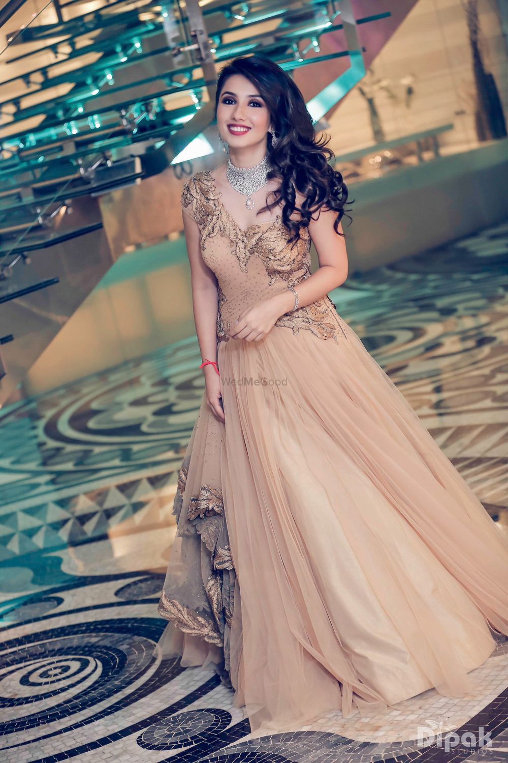 Photo of Dull Gold Flared Single Shoulder Gown