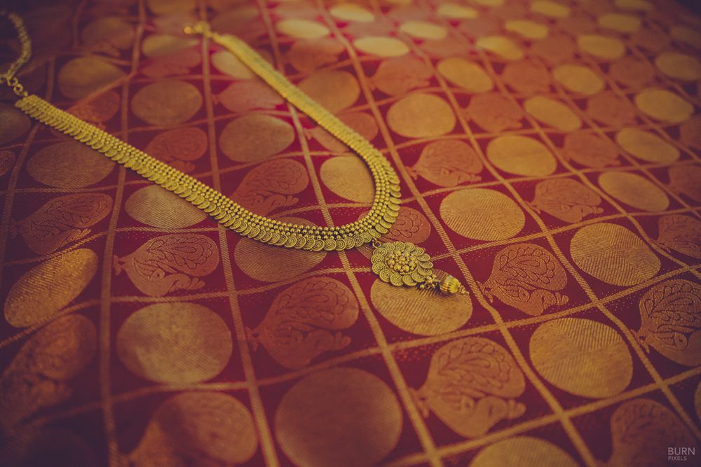 Photo of Gold Rani Necklace on Red Saree