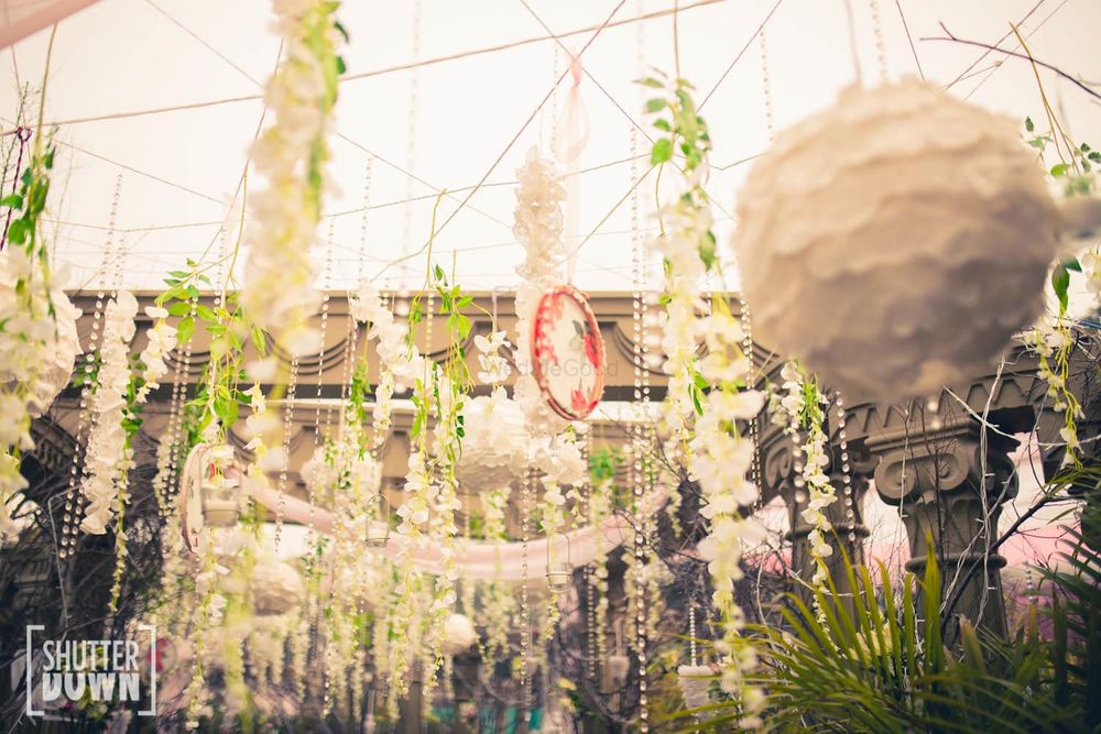 Photo of white floral hangings