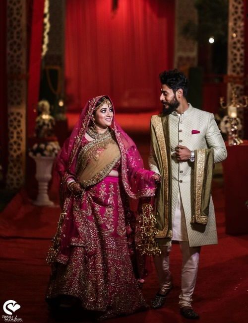 Photo of Couple portrait with bride in pink lehenga