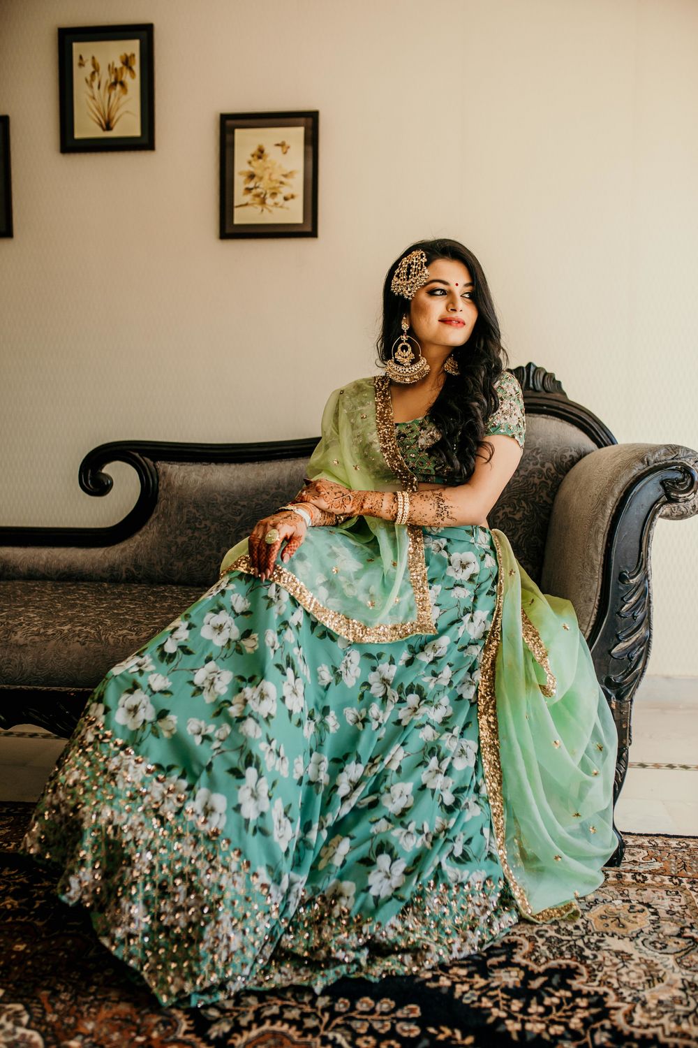Photo of Mehendi bridal look in green lehenga and jhoomar