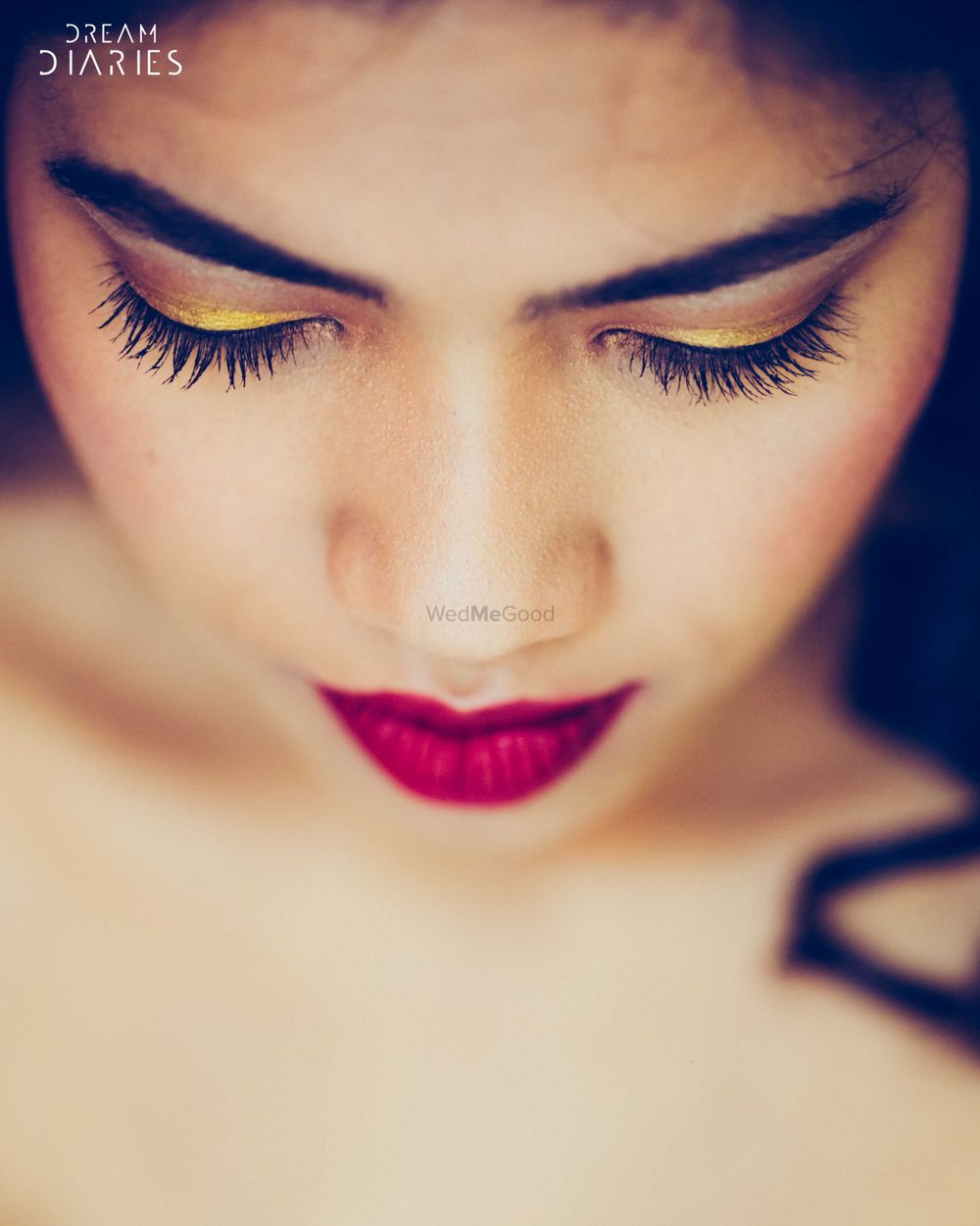 Photo of makeup with ruby red lips