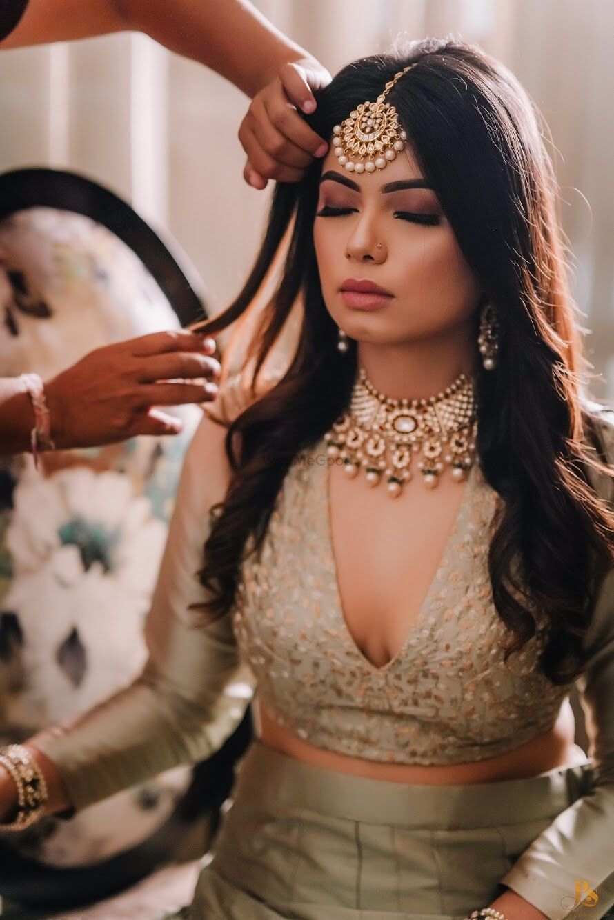 Photo of A bride to be getting ready for her engagement