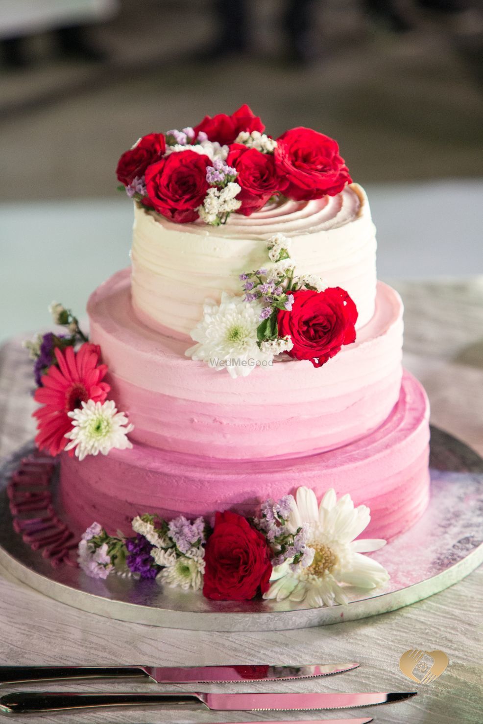 Photo of 3 tier ombre wedding cake with florals