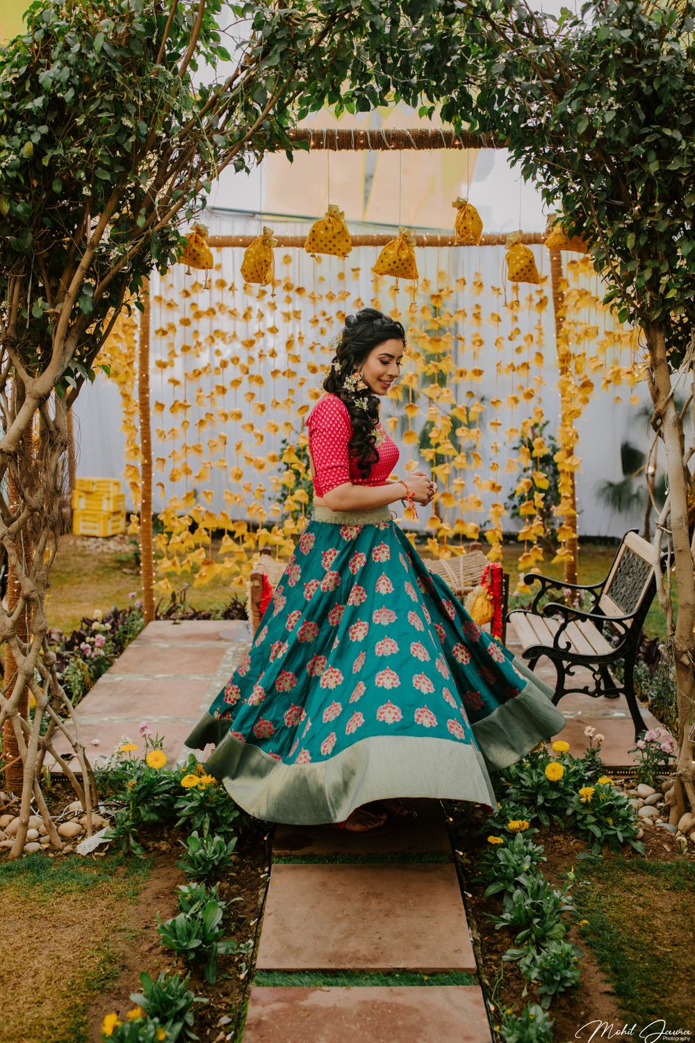 Photo of Bride twirling on her mehendi day