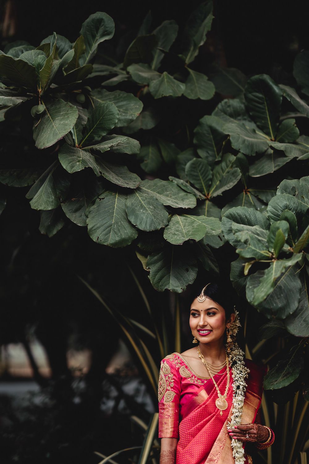 Photo of South indian bridal hairdo with flowers all over