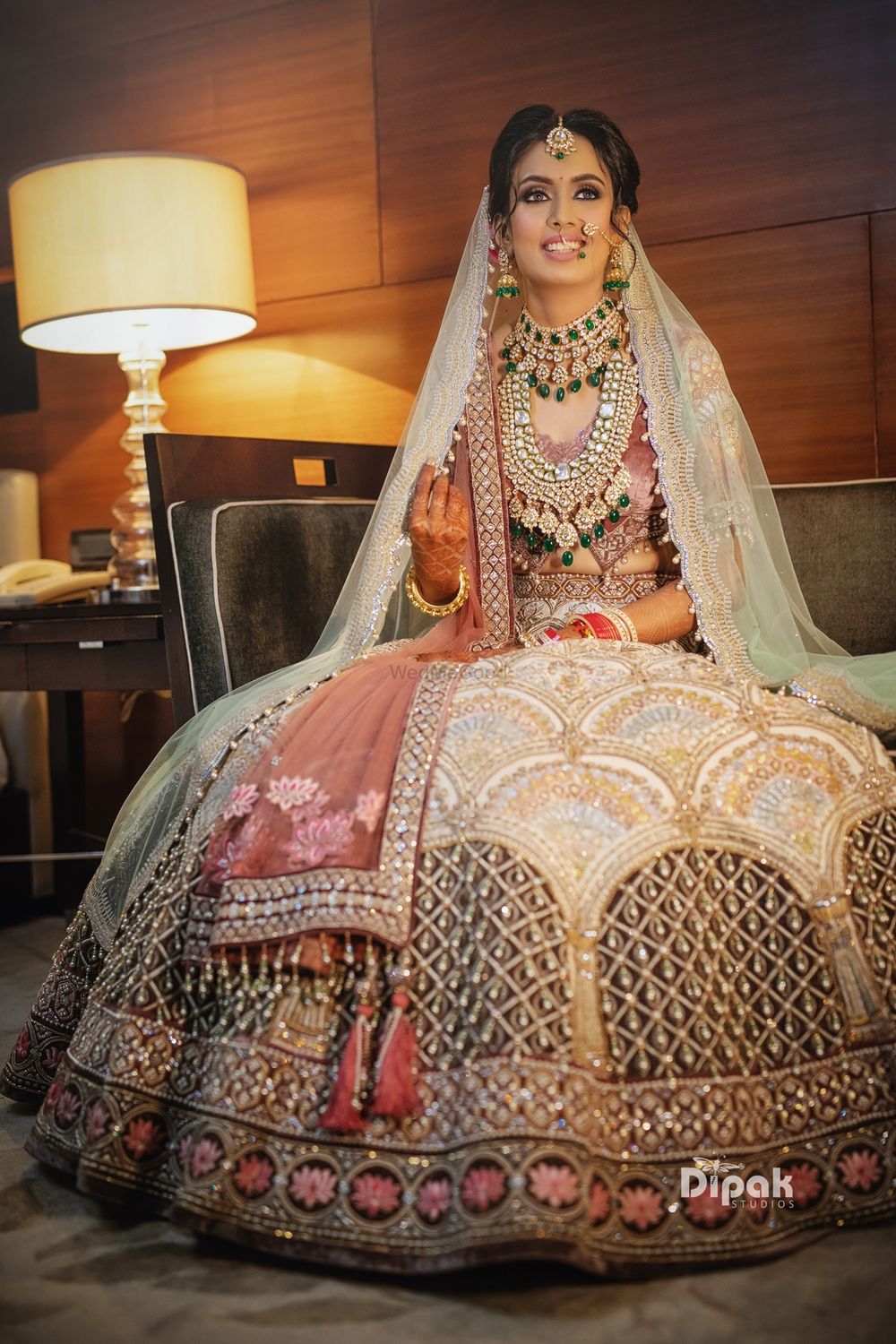 Photo of Unique bridal lehenga with contrasting dupatta