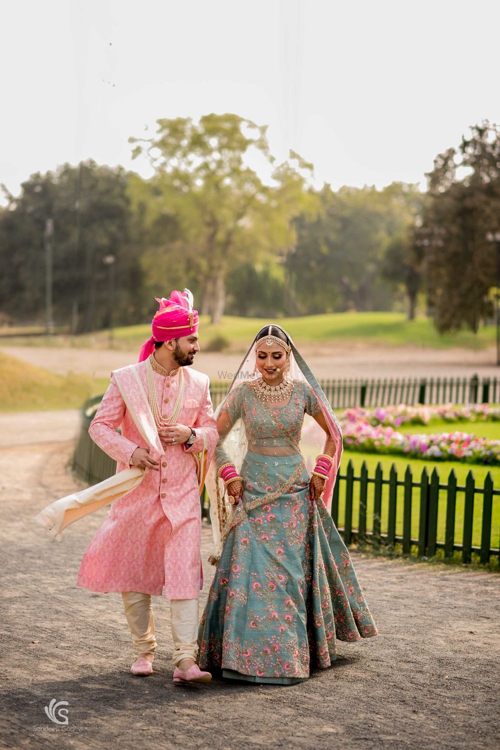 Photo of Offbeat bride and groom outfits for destination wedding