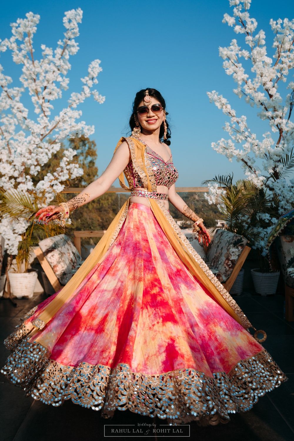 Photo of Colourful mehendi tye and dye lehenga