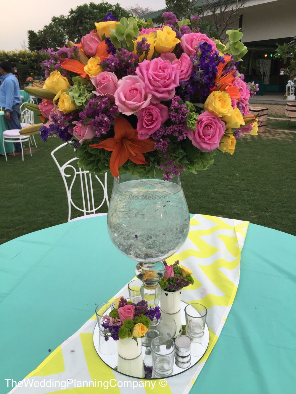 Photo of Crystal Vase with Floral Bouquet and Candles Decor