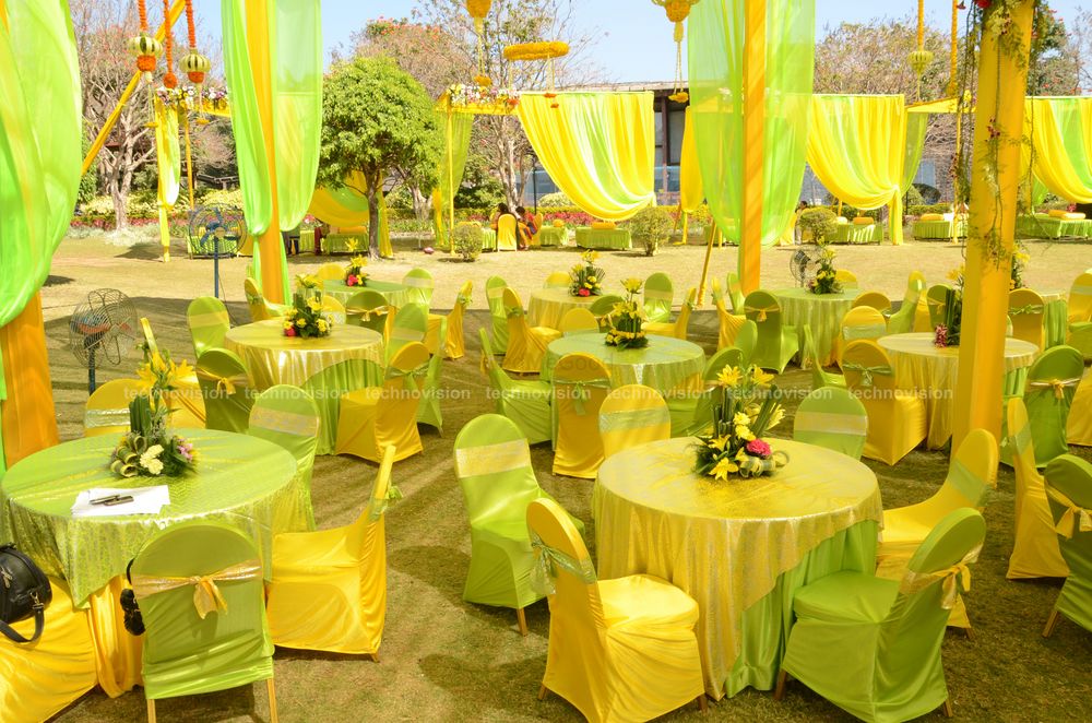 Photo of lime green and yellow mehendi decor