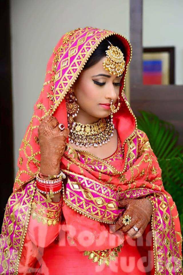 Photo of Punjabi bride with large maang tikka