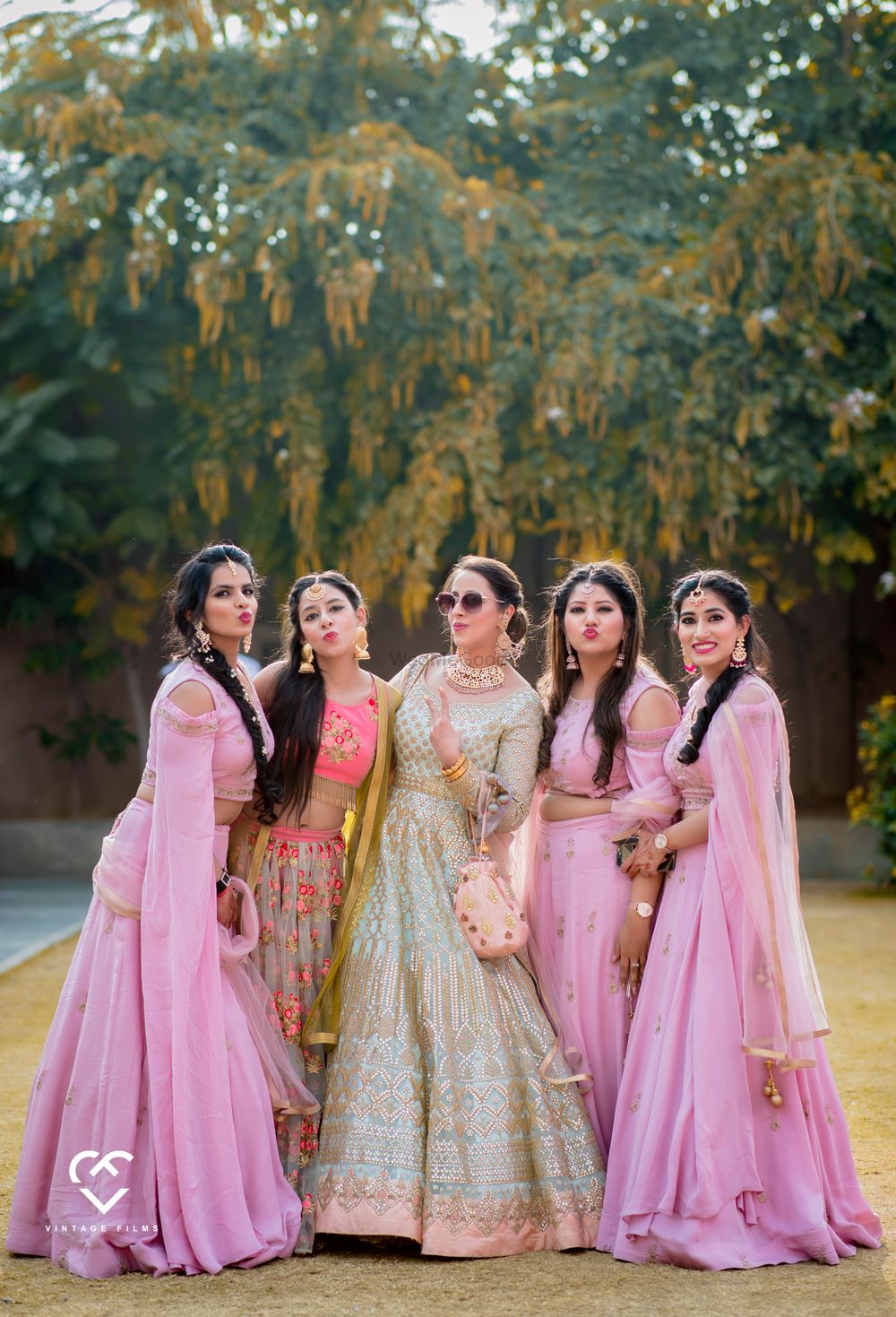 Photo of Cool bride with bridesmaids matching shot