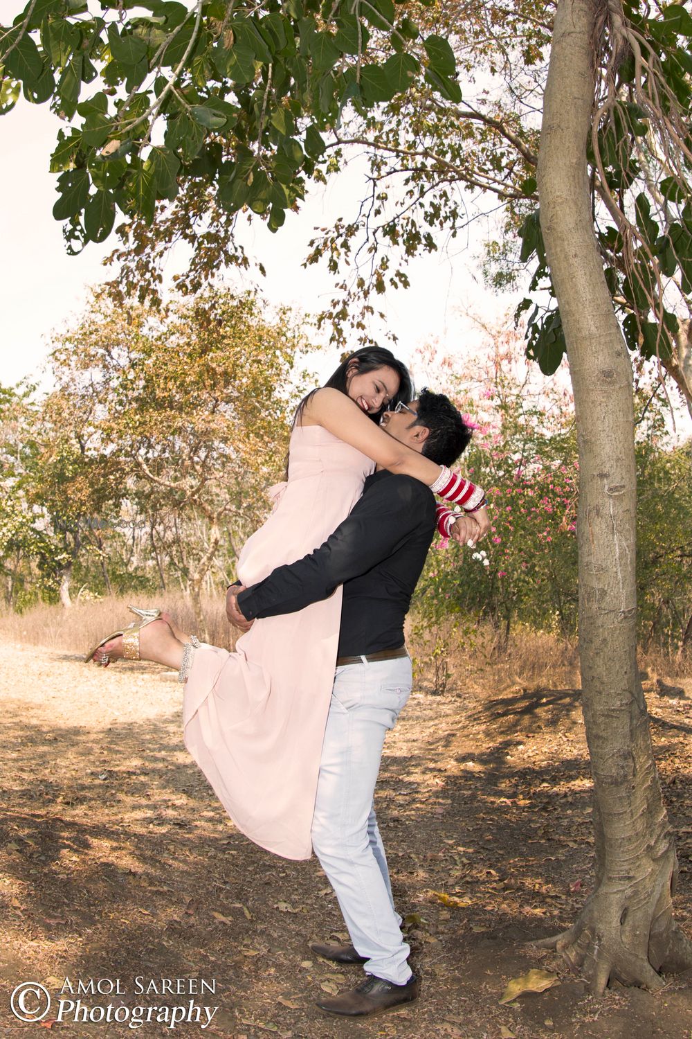 Photo of Couple Hugging Romantic Pre-Wedding Shot
