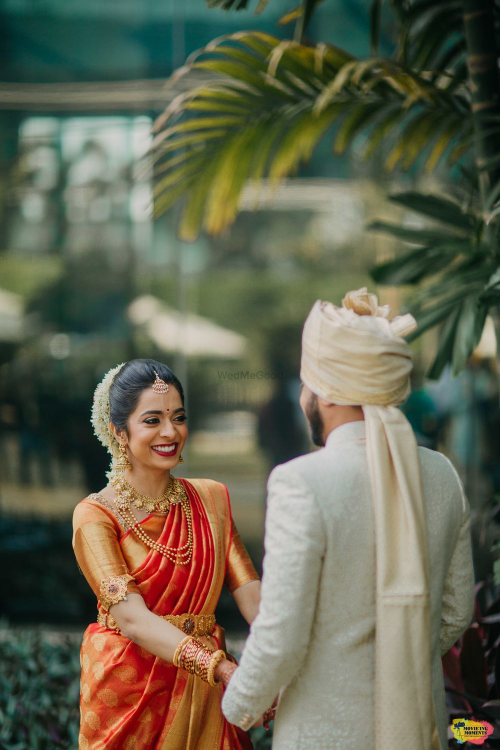 Photo of Happy bride in orange kanjivaram saree