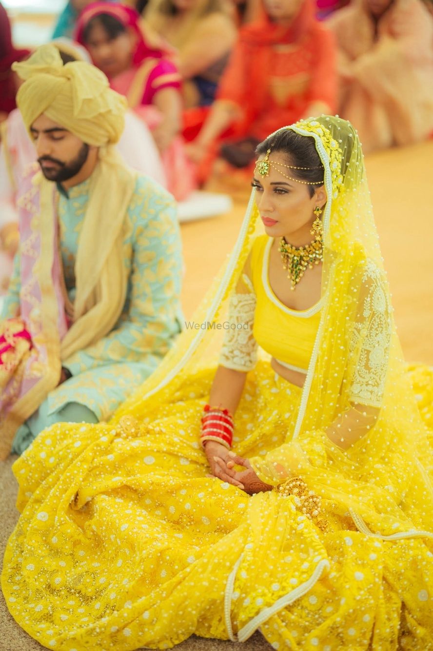 Photo of Bright yellow wedding lehenga for bride