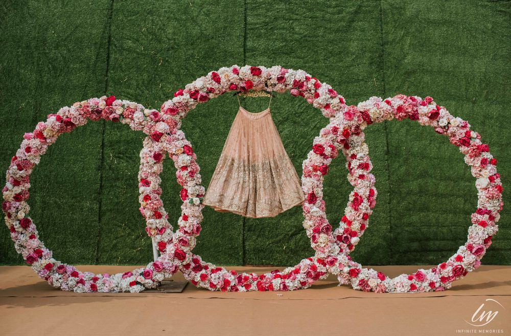 Photo of Lehenga on hanger with floral decor