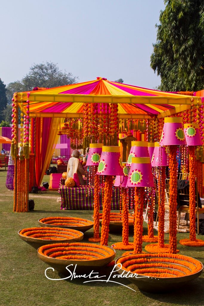 Photo of Funky Mehendi decor with buckets and marigold