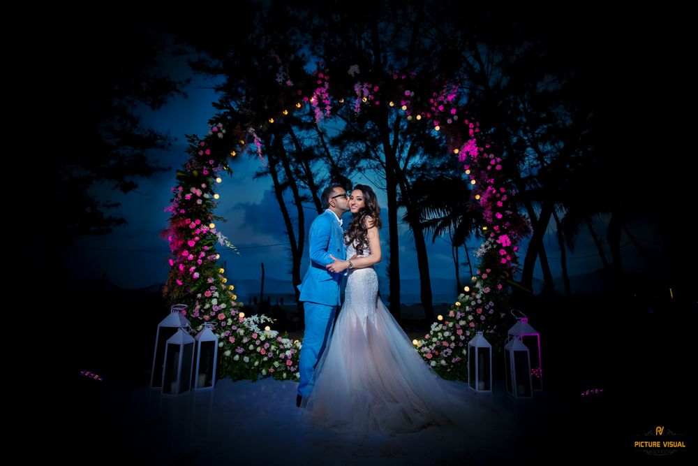 Photo of christian wedding decor photobooth idea with floral arch