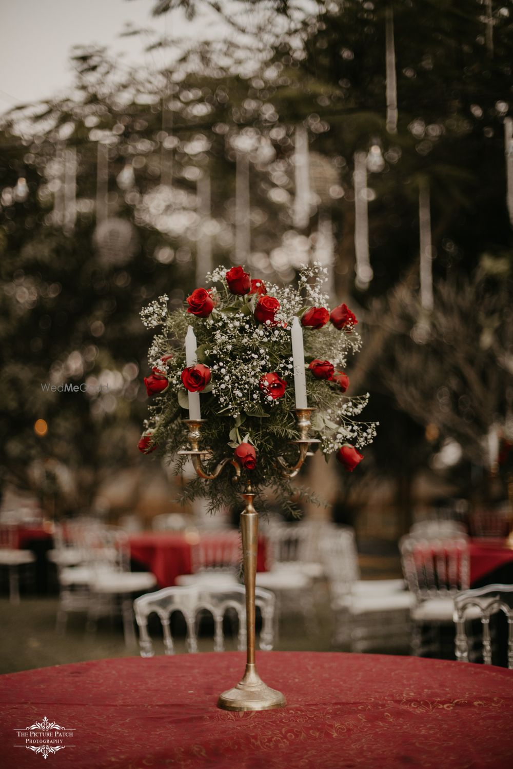 Photo of Floral table centerpiece with roses and baby breath!