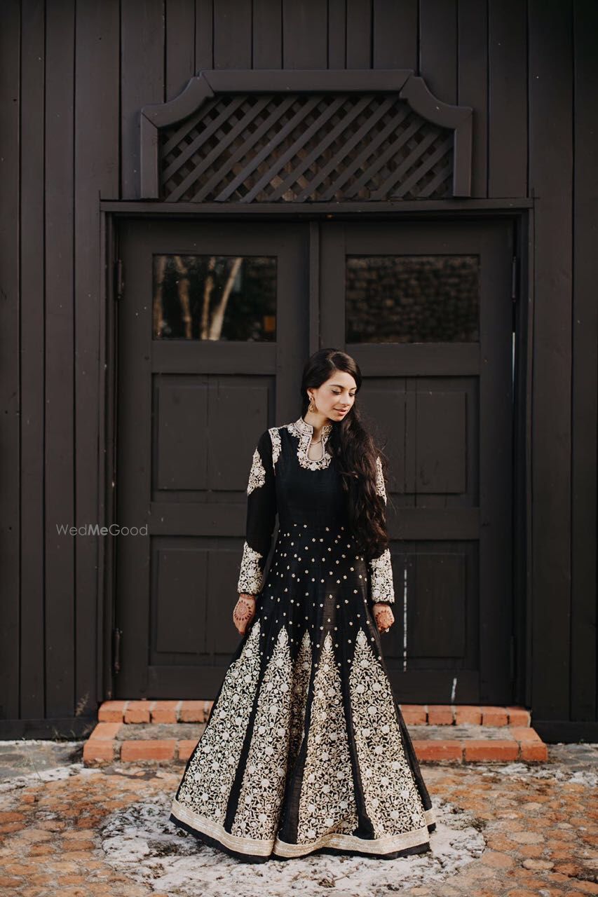 Photo of Black anarkali with silver motifs