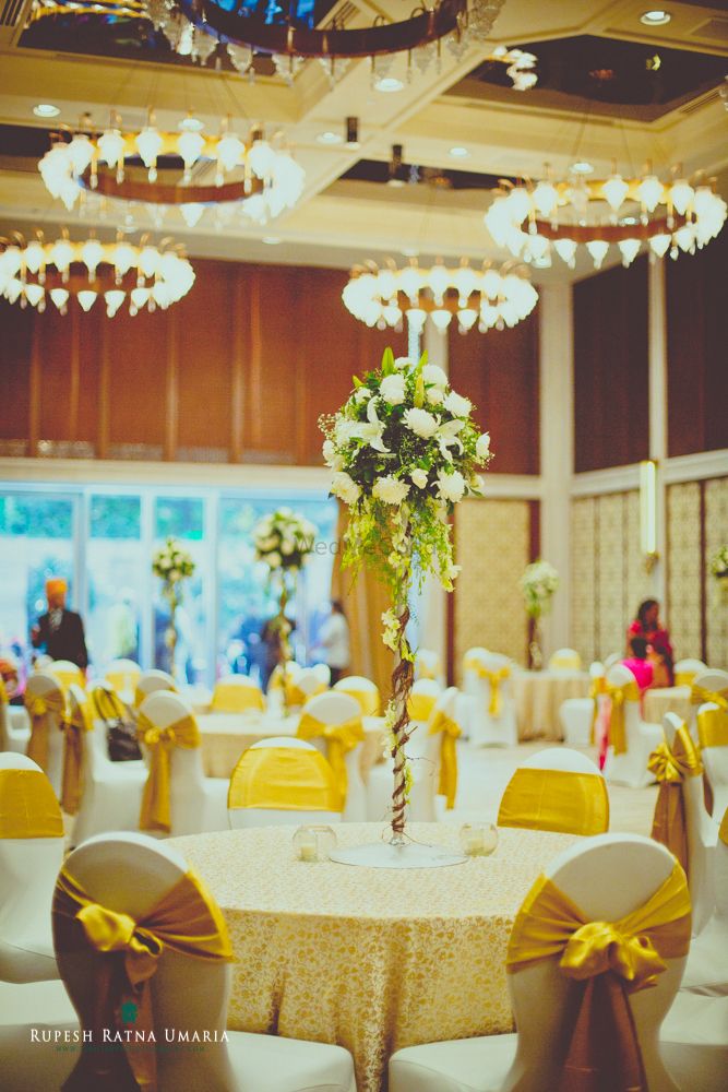 Photo of Cream and Gold Table Decor