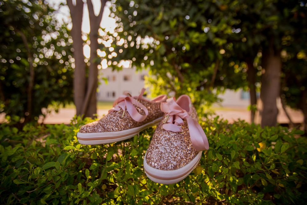 Photo of Light pink sparkly sneakers for bride