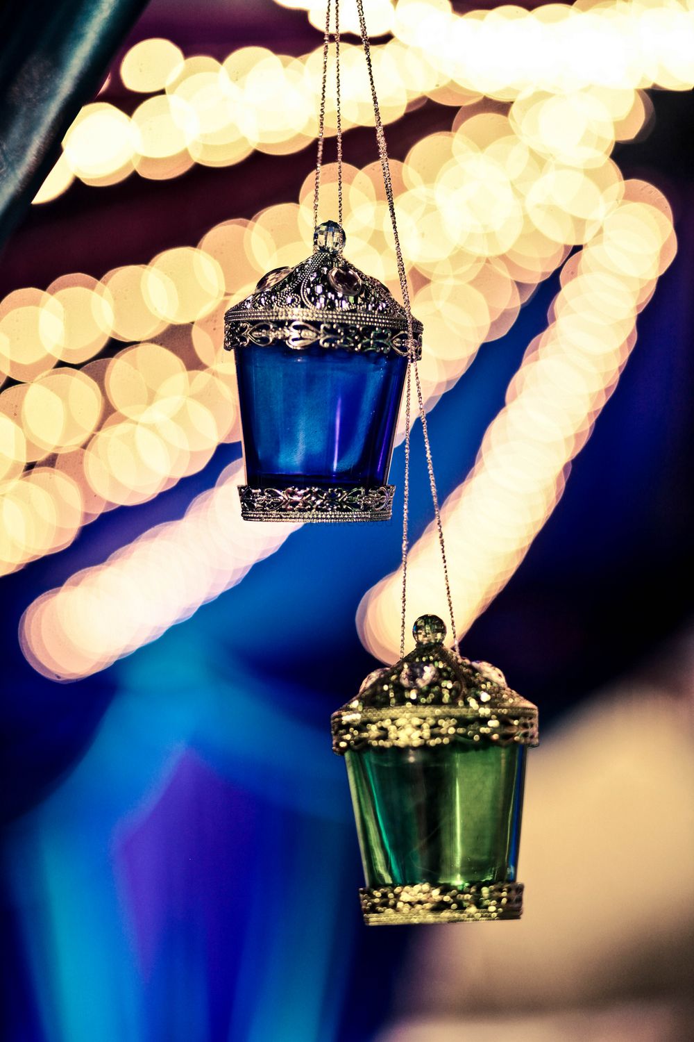 Photo of Blue and Green Hanging Lanterns