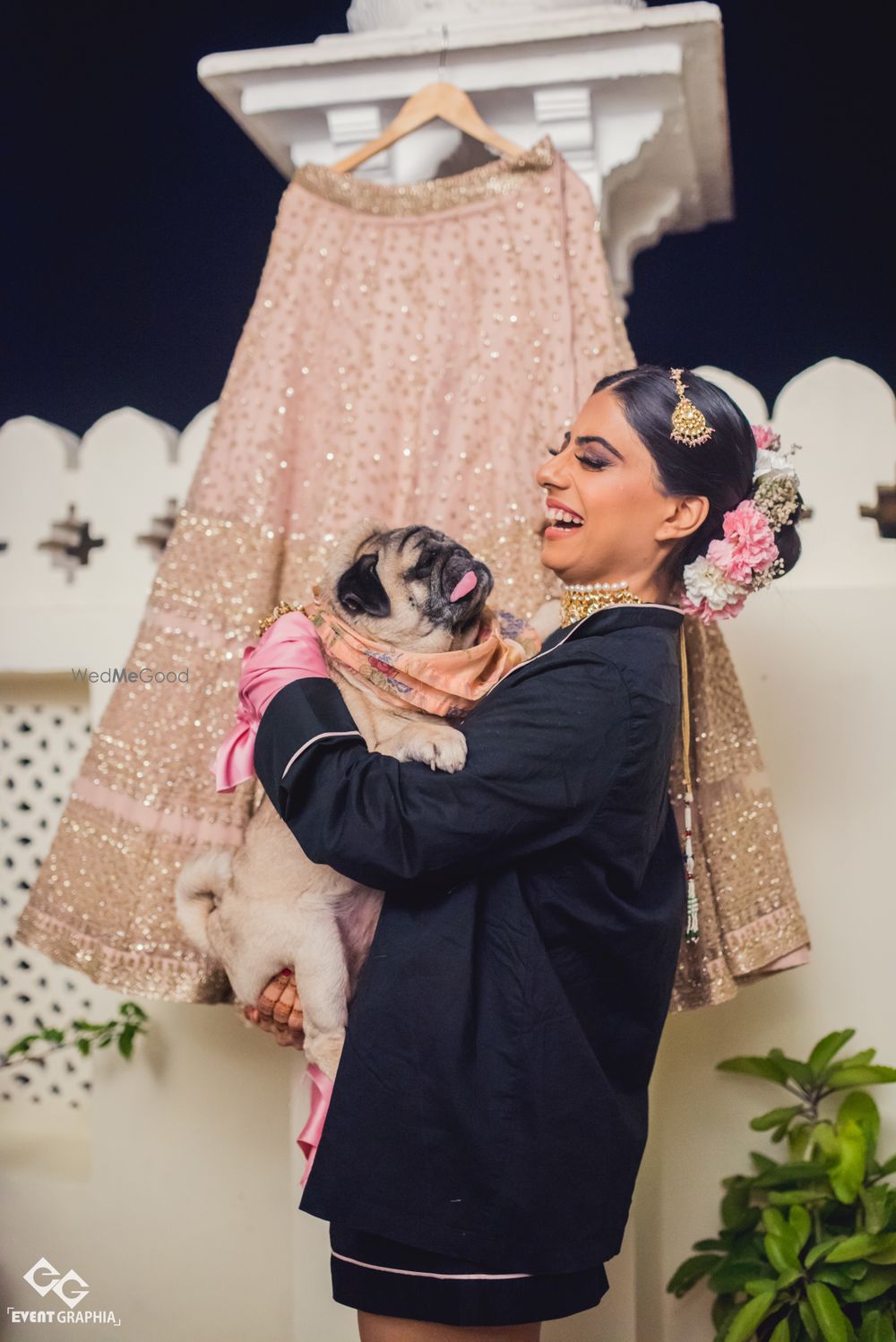 Photo of Bride getting ready shot idea with lehenga and dog