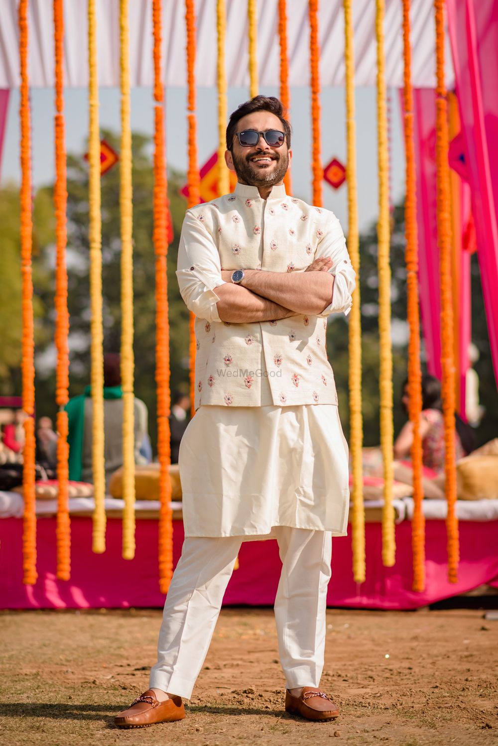 Photo of Mehendi groomwear with off white nehru jacket