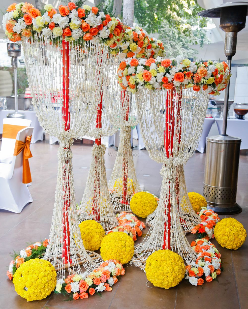 Photo of Wedding floral arrangements with yellow flowers