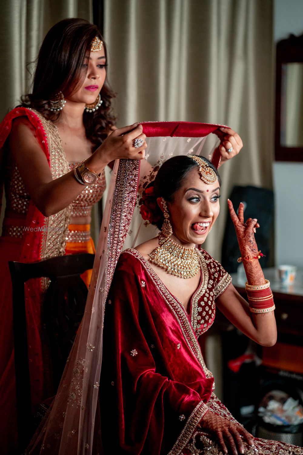 Photo of Fun bridal portrait with bride fooling around