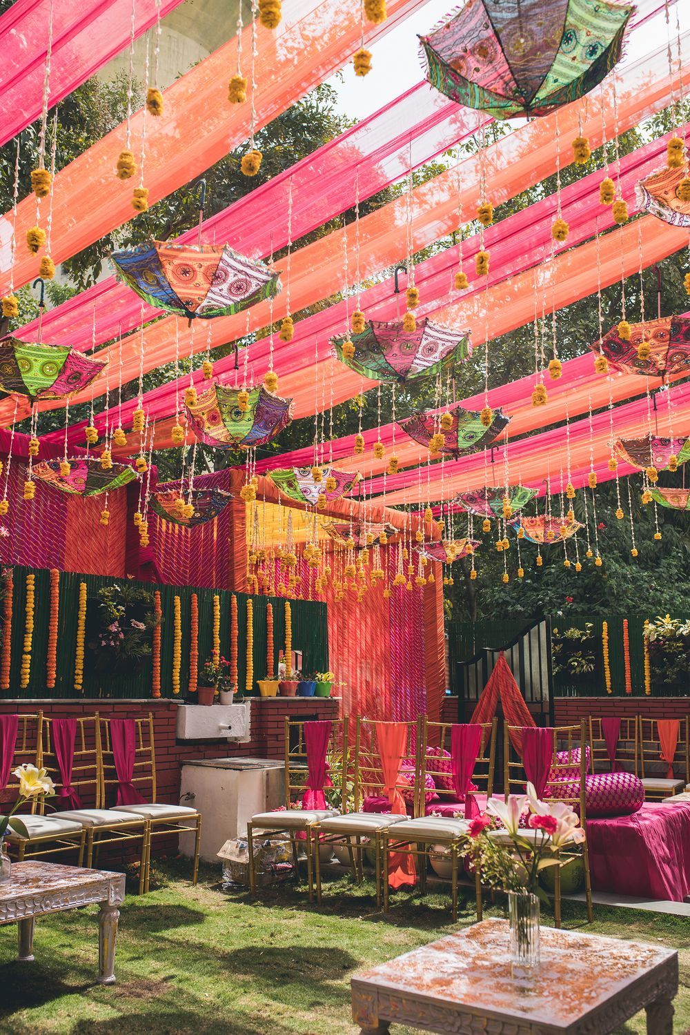 Photo of Suspended umbrella decor at a day mehendi function