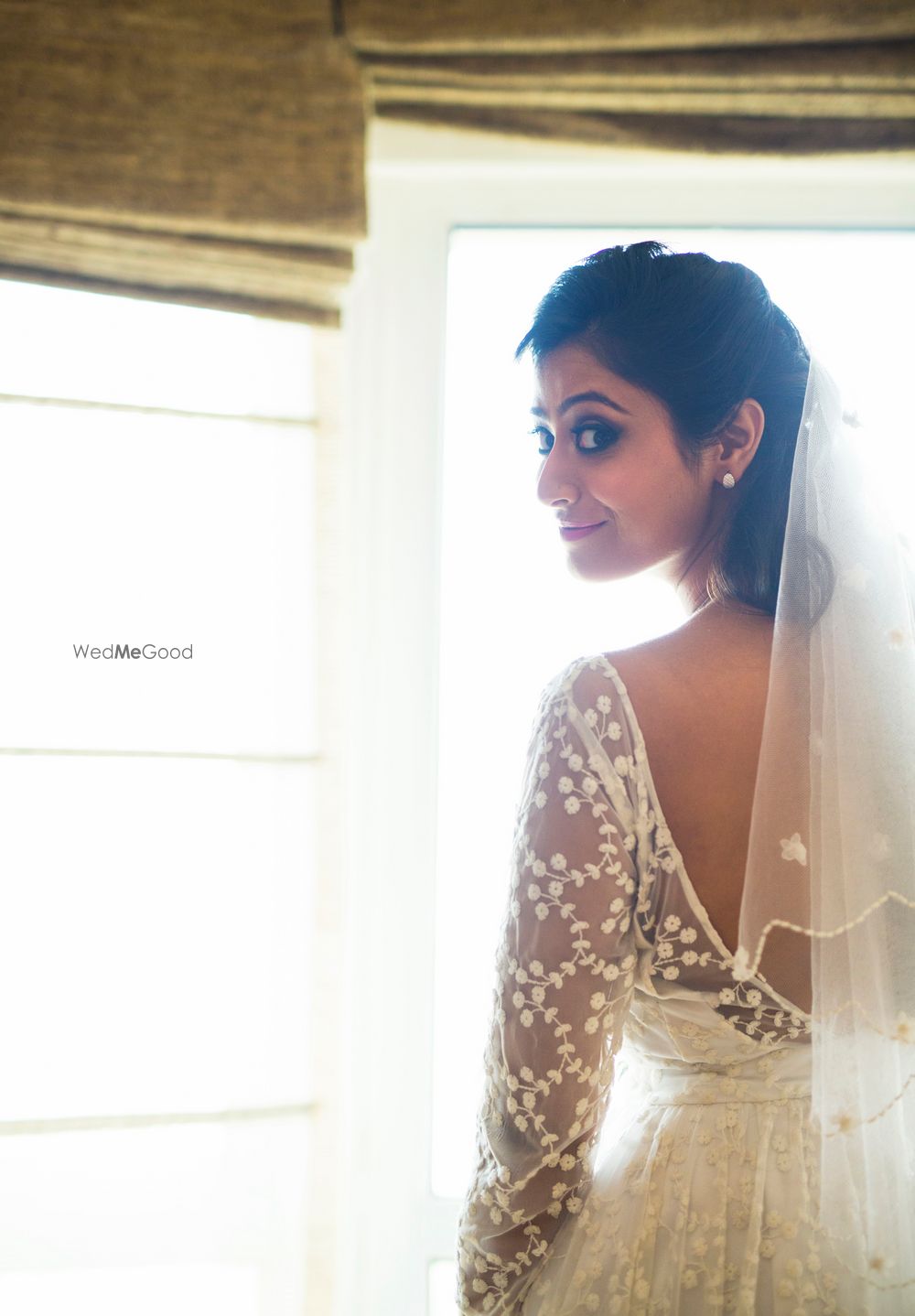 Photo of Bride Looking Back Shot